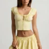 Haut corset en popeline de coton froncée Faela, couleur jaune citron Haut corset en popeline de coton froncée Faela, couleur jaune citron