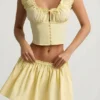 Haut corset en popeline de coton froncée Faela, couleur jaune citron Haut corset en popeline de coton froncée Faela, couleur jaune citron