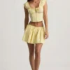Haut corset en popeline de coton froncée Faela, couleur jaune citron Haut corset en popeline de coton froncée Faela, couleur jaune citron