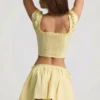 Haut corset en popeline de coton froncée Faela, couleur jaune citron Haut corset en popeline de coton froncée Faela, couleur jaune citron