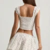 Haut corset en popeline de coton froncée Faela à imprimé de roses Haut corset en popeline de coton froncée Faela à imprimé de roses