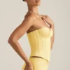 Haut corset à lacets Araminta en jaune pastel