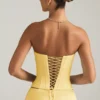 Haut corset à lacets Araminta en jaune pastel