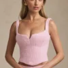 Haut corset à lacets Nami en rose pâle