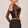Haut corset à manches longues Zella en noir Haut corset à manches longues Zella en noir