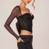 Haut corset à manches longues Zella en noir Haut corset à manches longues Zella en noir