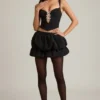 Haut corset Pearla noir avec découpes et nœuds Haut corset Pearla noir avec découpes et nœuds
