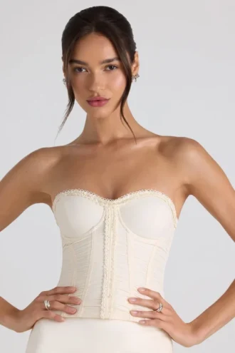 Haut corset sans bretelles à lacets et fronces Melvina, couleur ivoire