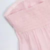 Haut court sans bretelles en popeline de coton à nouer sur le devant Alma, rayures roses et blanches Haut court sans bretelles en popeline de coton à nouer sur le devant Alma, rayures roses et blanches