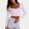 Haut court sans coutures en modal à côtes souples et découpes, rose poudré Haut court sans coutures en modal à côtes souples et découpes, rose poudré