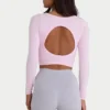 Haut court sans coutures en modal à côtes souples et découpes, rose poudré Haut court sans coutures en modal à côtes souples et découpes, rose poudré
