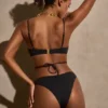 Bas de bikini couvrant Icaria avec détails métalliques, noir