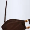 Haut de bikini bandeau Manava orné de perles, couleur chocolat foncé Haut de bikini bandeau Manava orné de perles, couleur chocolat foncé