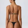 Haut de bikini noir Sanibel à découpes et chaînes Haut de bikini noir Sanibel à découpes et chaînes