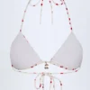 Haut de bikini triangle Calella avec détails charmants, imprimé cerise Haut de bikini triangle Calella avec détails charmants, imprimé cerise