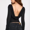 Haut dos nu à manches longues en jersey transparent Nari, noir Haut dos nu à manches longues en jersey transparent Nari, noir
