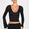 Haut à manches longues en jersey transparent Liah, décolleté plongeant, noir Haut à manches longues en jersey transparent Liah, décolleté plongeant, noir