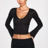 Haut à manches longues en jersey transparent Liah, décolleté plongeant, noir Haut à manches longues en jersey transparent Liah, décolleté plongeant, noir