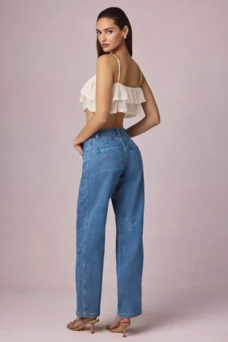 Jean Bobbi à taille mi-haute et jambes évasées, délavage bleu moyen