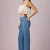 Jean Bobbi à taille mi-haute et jambes évasées, délavage bleu moyen Jean Bobbi à taille mi-haute et jambes évasées, délavage bleu moyen
