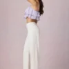 Jean Bobbi à taille mi-haute et jambes évasées, délavage écru