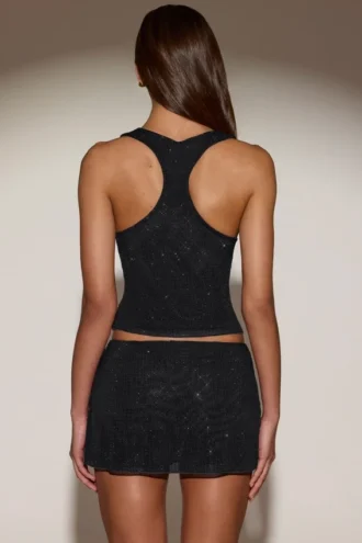 Jupe A-line à taille mi-haute et ornements Asta, en noir