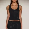 Jupe A-line à taille mi-haute et ornements Asta, en noir Jupe A-line à taille mi-haute et ornements Asta, en noir