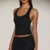Jupe A-line à taille mi-haute et ornements Asta, en noir Jupe A-line à taille mi-haute et ornements Asta, en noir