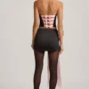 Jupe Carola en satin à nœud et taille basse, couleur noire