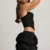 Jupe Imani à ourlet bouffant et taille mi-haute, en noir