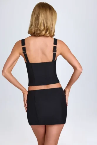 Jupe Issa à taille basse et coupe cintrée, couleur noir