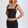 Jupe Issa à taille basse et coupe cintrée, couleur noir Jupe Issa à taille basse et coupe cintrée, couleur noir
