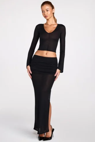 Jupe longue drapée en jersey transparent à taille basse Diana, en noir