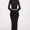 Jupe longue drapée en jersey transparent à taille basse Diana, en noir