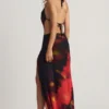 Jupe longue fendue à taille mi-haute Keona, imprimé flou rouge Jupe longue fendue à taille mi-haute Keona, imprimé flou rouge