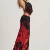 Jupe longue fendue à taille mi-haute Keona, imprimé flou rouge Jupe longue fendue à taille mi-haute Keona, imprimé flou rouge