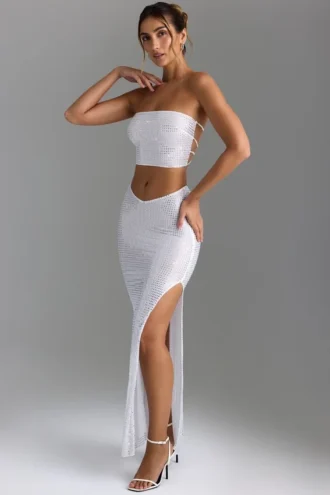 Jupe longue Pelagia à taille en V et fente sur la cuisse, en blanc