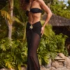 Jupe longue évasée à fronces et détails métalliques Bacalar, en noir Jupe longue évasée à fronces et détails métalliques Bacalar, en noir