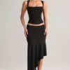 Jupe mi-longue asymétrique taille basse Niva en modal noir Jupe mi-longue asymétrique taille basse Niva en modal noir