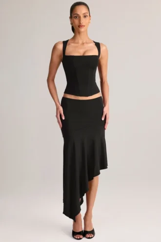 Jupe mi-longue asymétrique taille basse Niva en modal noir