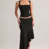 Jupe mi-longue asymétrique taille basse Niva en modal noir Jupe mi-longue asymétrique taille basse Niva en modal noir