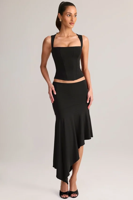 Jupe mi-longue asymétrique taille basse Niva en modal noir Jupe mi-longue asymétrique taille basse Niva en modal noir