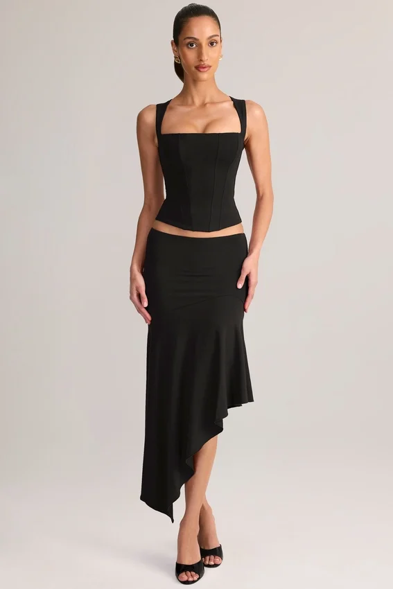 Jupe mi-longue asymétrique taille basse Niva en modal noir Jupe mi-longue asymétrique taille basse Niva en modal noir