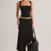 Jupe mi-longue asymétrique taille basse Niva en modal noir Jupe mi-longue asymétrique taille basse Niva en modal noir