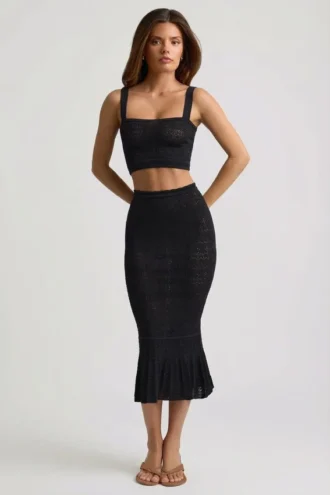 Jupe mi-longue Yasira en maille pointelle à volants, couleur noire