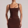 Jupe moulante taille moyenne Tula avec fente, couleur marron chocolat Jupe moulante taille moyenne Tula avec fente, couleur marron chocolat