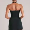 Jupe moulante taille moyenne Tula avec fente, en noir Jupe moulante taille moyenne Tula avec fente, en noir
