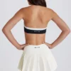 Jupe-short de tennis plissée Soft Active à taille basse, couleur ivoire Jupe-short de tennis plissée Soft Active à taille basse, couleur ivoire