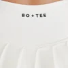 Jupe-short de tennis plissée Soft Active à taille basse, couleur ivoire Jupe-short de tennis plissée Soft Active à taille basse, couleur ivoire