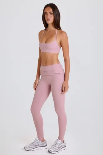 Legging à taille mi-haute et sangles en mauve